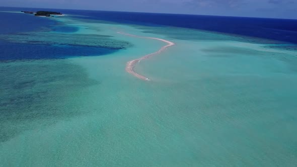 Aerial drone abstract of coastline beach break by blue ocean and sand background