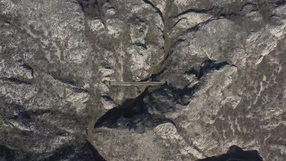 Descending over the railroad bridge 4K drone footage