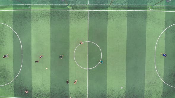 Start of Training Before a Football Match. Game Process. Aerial Shot of a Small Soccer Field, Two