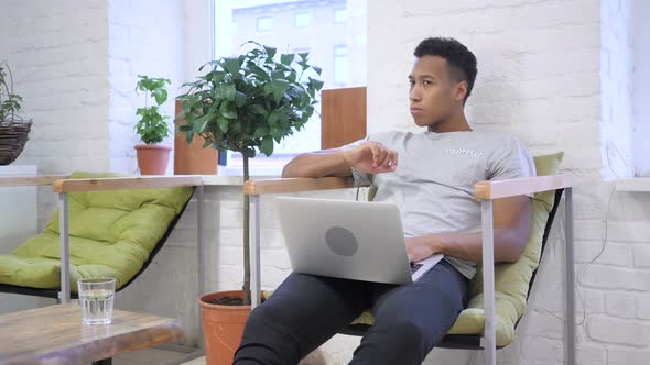 Thinking, Portrait of Pensive African Designer at Work