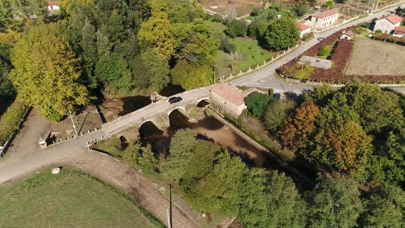 Driving on Rural Bridge alt