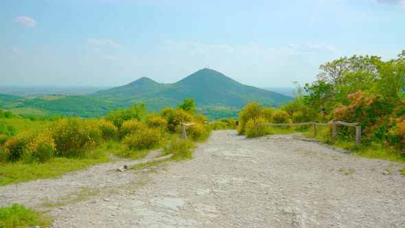 Scenic Dirt Path on the Hills in Spring