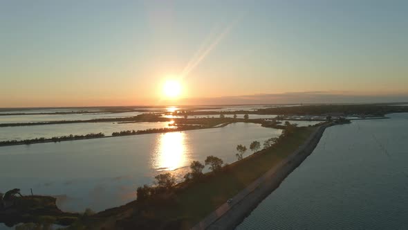 Sunset in the park of the Po River Delta