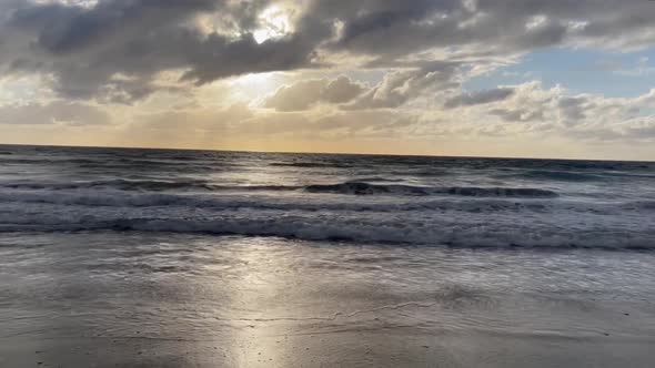 Ocean Waves At Sunset