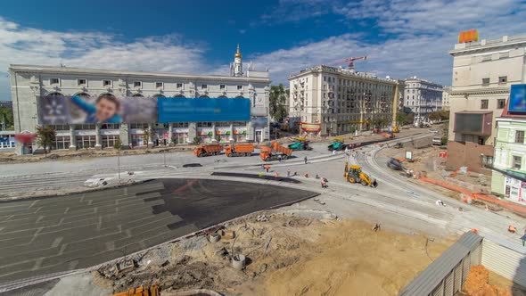 Asphalt Paver, Roller and Truck on the Road Repair Site During Asphalting Timelapse. Road