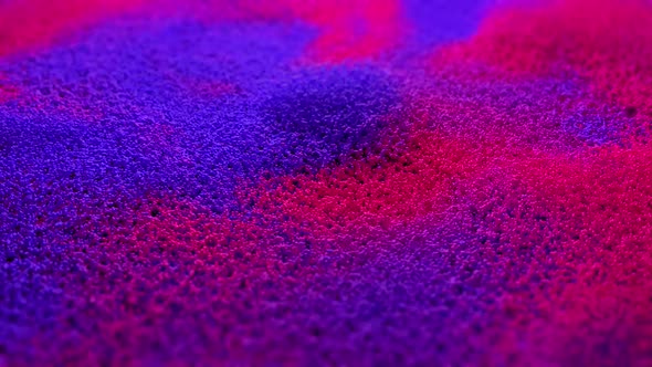 Abstract background with pink purple floating particles