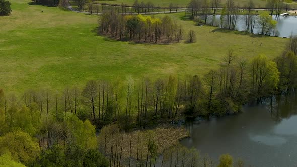 Aerial flying over Myslecinek largest city park with beautiful  in Poland