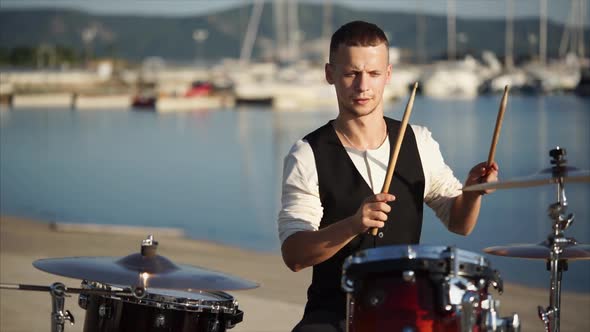 Professional Drummer Playing Music Outdoor