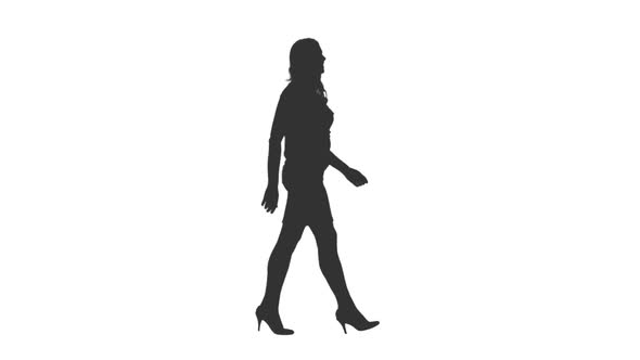 Silhouette of Young Attractive Woman Walks on High Heels