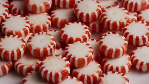 Rotating shot of peppermint candies - CANDY PEPPERMINT 