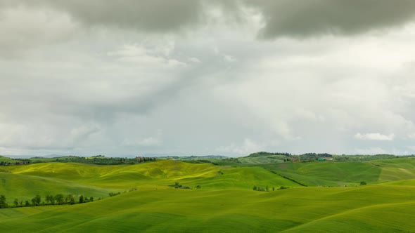 Time lapse of the clouds over the hills of Tuscany Italy