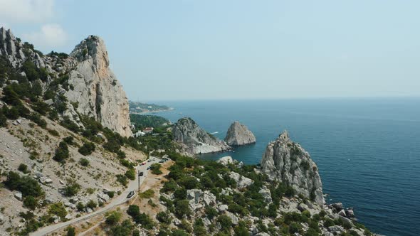 Aerial Fly Around Mountain Koshka Revealing Small City of Simeiz