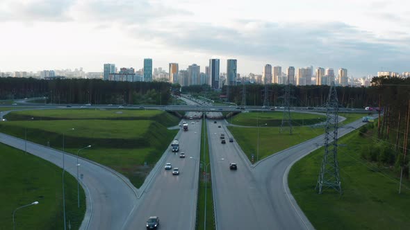 Aerial View of a Busy Motorway Interchange with a Lot of Traffic