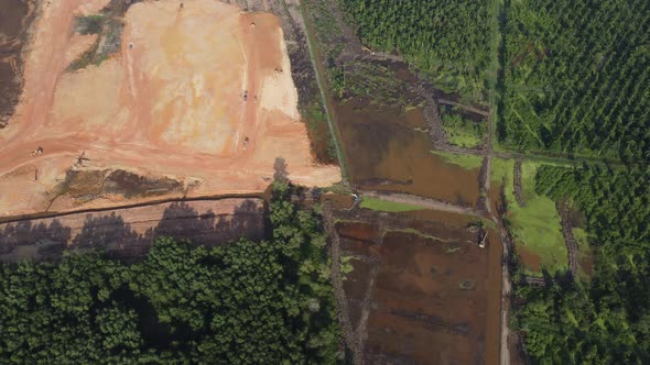 Aerial view site development and oil palm clearing