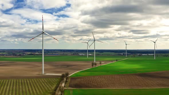 White wind turbines as alternative energy, aerial view, Poland