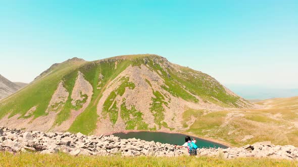 Solo Woman Hiker In High Mountains