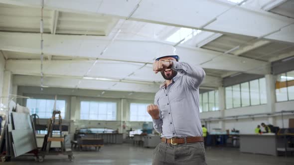 Portrait of Adult Bearded Man Head Director or Engineer Wearing Suit and Helmet Rejoicing with