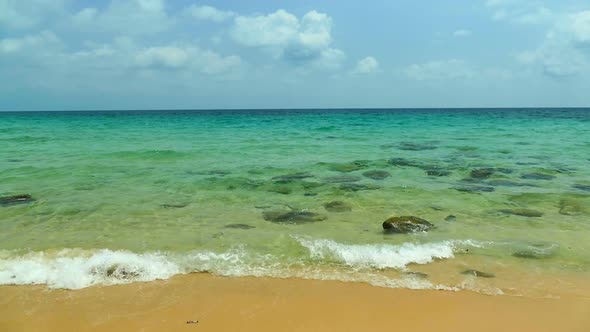 Beautiful tropical beach sea ocean with blue sky and white cloud