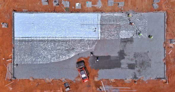 Work on Leveling Gravel on Construction Site with an Excavator Before Preparing Pouring Concrete on