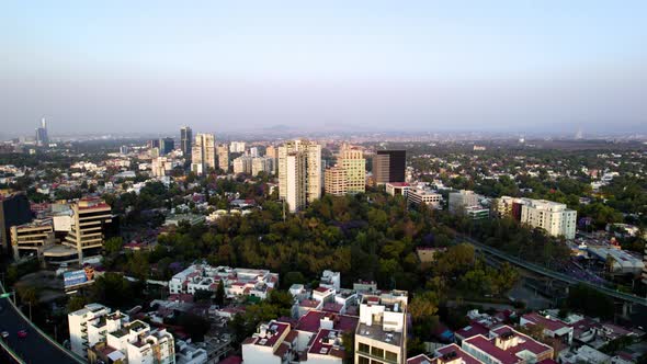 elevation shot from a dron of south mexico city during highly polluted day