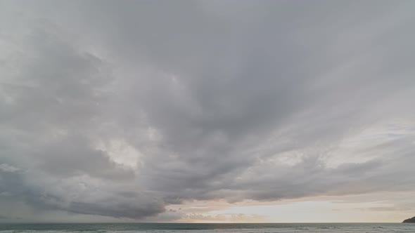 Time Lapse Cloudy In Sky Of Sunset Over The Ocean.