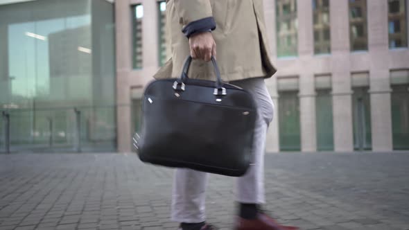 Confident Male Successful Lawyer Cellphone Calling While Walking to Meeting with Clients