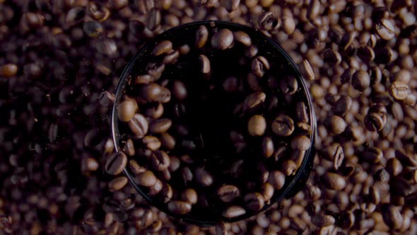 Process Grinding Coffee Grains Close Up