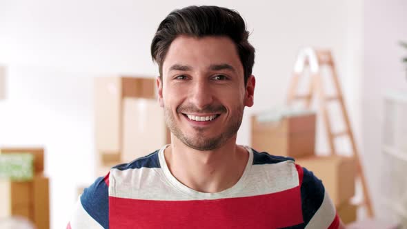 Portrait of smiling man in his new flat  