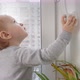 Baby pressing knob and pulling window handle - VideoHive Item for Sale