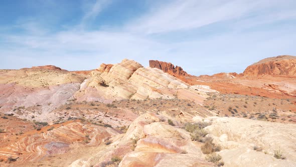 Panorama Of A Rocky Massif With Multicolored Wavy Formations