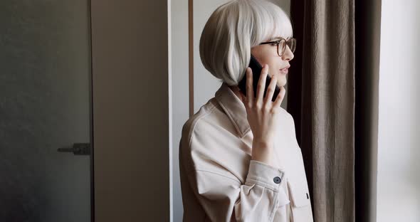 Smiling Young Business Woman Professional Talking on Phone Sit at Home