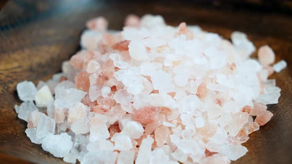 Rotation of raw Himalayan pink salt crystals. 