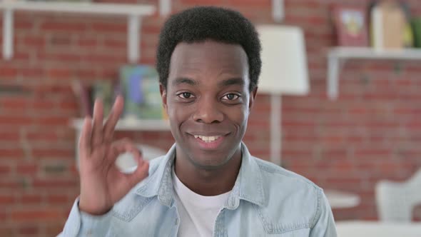 Positive African Man Showing OK Sign 