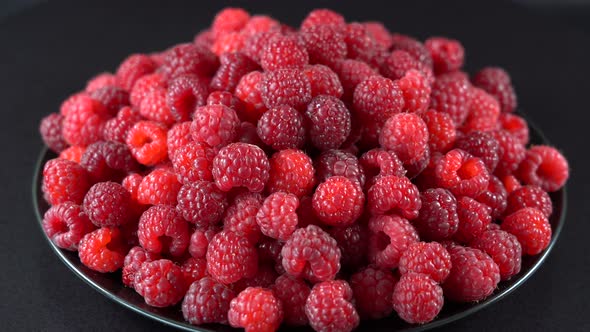 Fresh, ripe, juicy red raspberry background, close up berry, rotation, macro