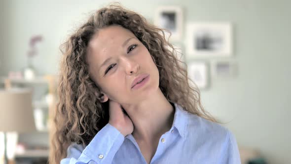 Curly Hair Woman Trying to Relax Neck Pain