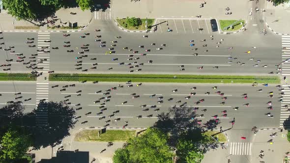 City Road Crowded by Cyclists during Bicycle Competition