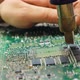 Electrician Repairing Motherboard Chips By Desoldering - VideoHive Item for Sale