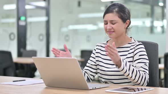 Upset Indian Woman Having Loss on Laptop in Office, Failure