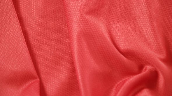 Close-up of football red jersey fabric 4k