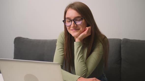 Happy Laughs Woman Freelance Using Laptop Has Call Video Conference in Workplace at Home