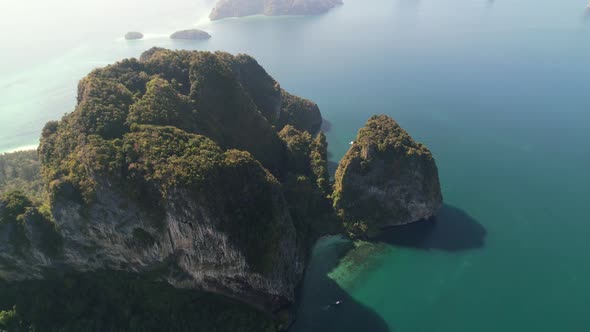 aerial top down view of the beautiful limestone mountains at Ko Poda Island in Krabi Thailand during