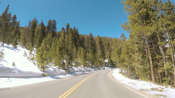 POV point of view -Driving through Rocky Mountain National Park in the Spring.