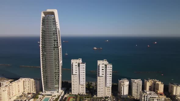 Embankment of Limassol in Cyprus. Modern architecture and old town. Skyscrapers.