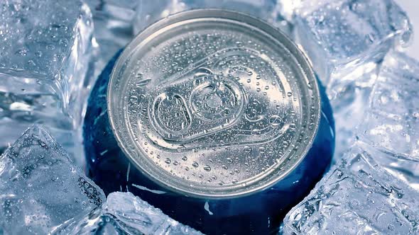 Aluminum Soda Tin Can Lid Cover of Soft Drink on Ice Goes Around the Circle