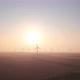 Windmills with rotating wings at sunrise or sunset or sunrise. - VideoHive Item for Sale