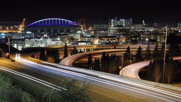 Jose Rizal Bridge View Of Seattle Freeway At Night With Lit Sports Stadium