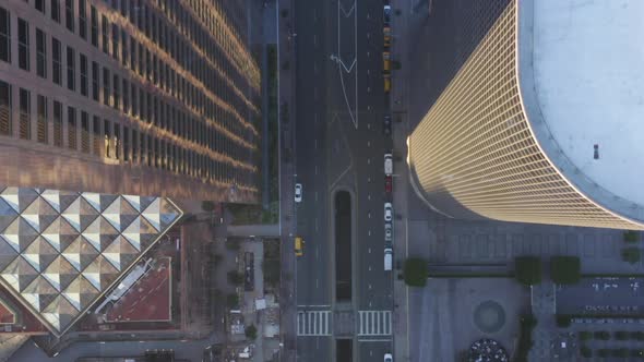 AERIAL: Slow Birds Eye View Flight Over Downtown Los Angeles California in Beautiful Sunrise Light