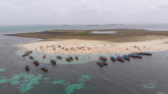 Aerial View Disappearing Island with Tourists and Boats in Menai Bay Zanzibar