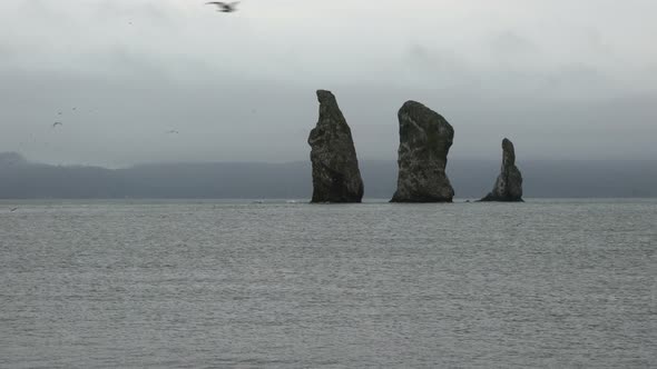 Kamchatka Peninsula Seascape: Picturesque View of Rocky Islands in Pacific Ocean