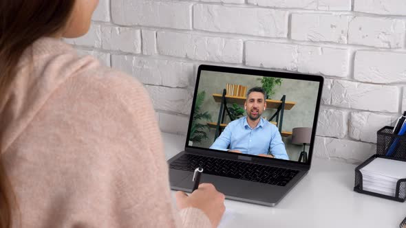 Man teacher in laptop screen speak teaches by remote webcam, distance education